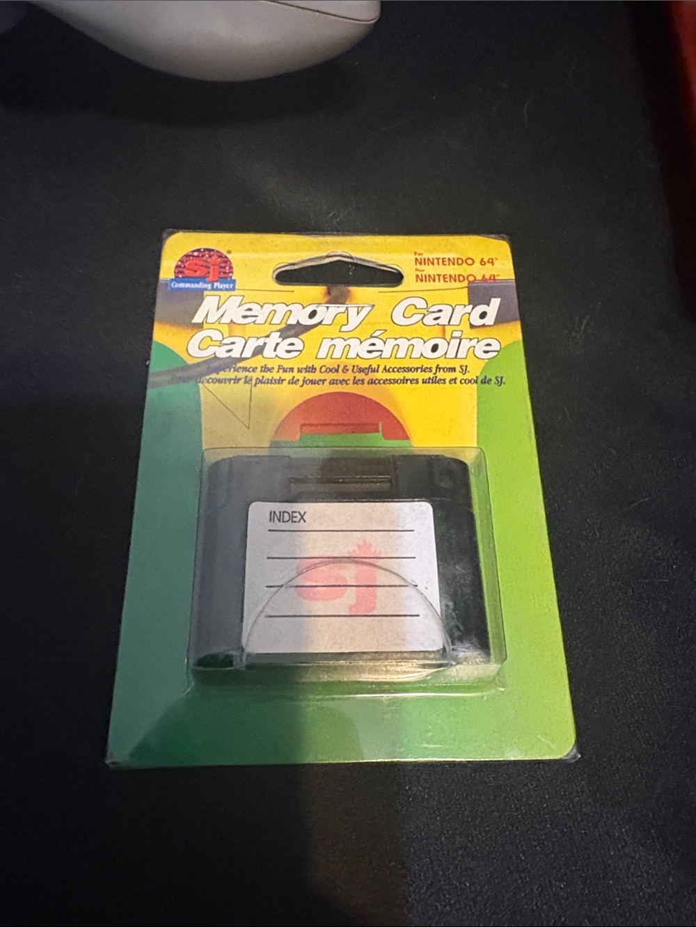 Nintendo Memory Card with Green and Yellow Cardboard Backing